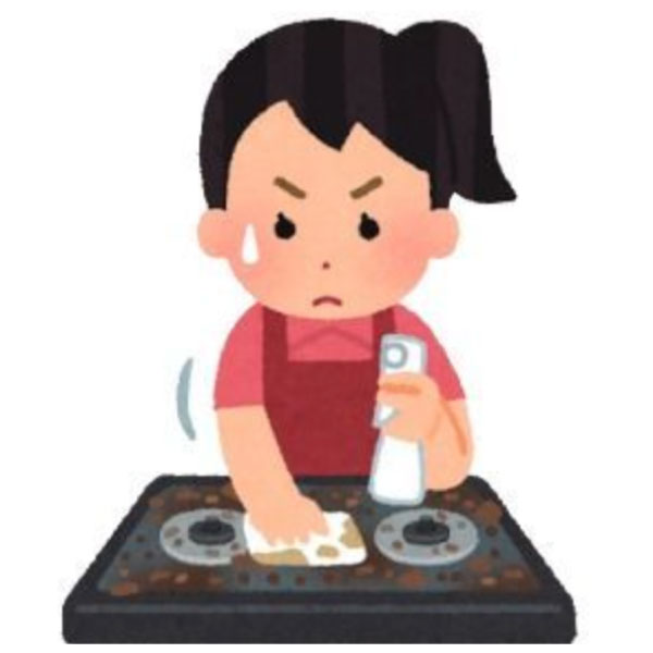 コンロを掃除する女性
